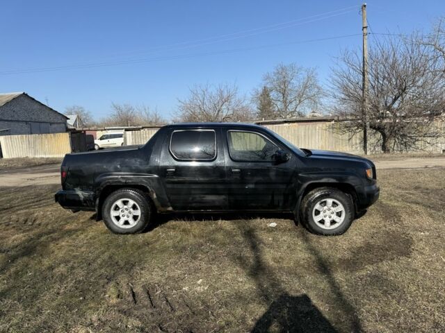 Чорний Хонда Ріджлайн, об'ємом двигуна 3.5 л та пробігом 198 тис. км за 5500 $, фото 4 на Automoto.ua