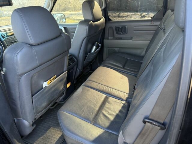 Чорний Хонда Ріджлайн, об'ємом двигуна 3.5 л та пробігом 198 тис. км за 5500 $, фото 11 на Automoto.ua