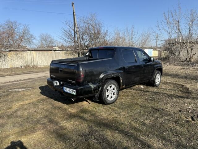 Чорний Хонда Ріджлайн, об'ємом двигуна 3.5 л та пробігом 198 тис. км за 5500 $, фото 7 на Automoto.ua