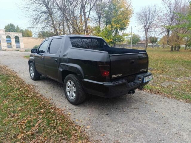 Хонда Ріджлайн 2006 у Харкові на Automoto.ua Чорний Хонда Ріджлайн, об'ємом двигуна 3.5 л та пробігом 277 тис. км за 7300 $, фото 5 на Automoto.ua