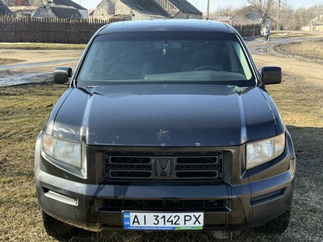 Чорний Хонда Ріджлайн, об'ємом двигуна 3.5 л та пробігом 198 тис. км за 5500 $, фото 1 на Automoto.ua