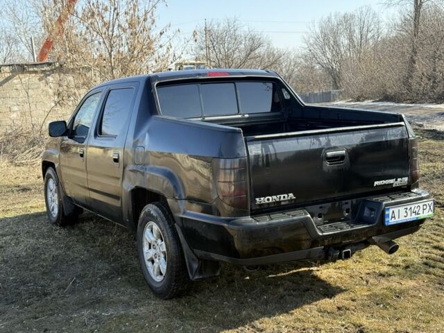 Чорний Хонда Ріджлайн, об'ємом двигуна 3.5 л та пробігом 198 тис. км за 5500 $, фото 5 на Automoto.ua