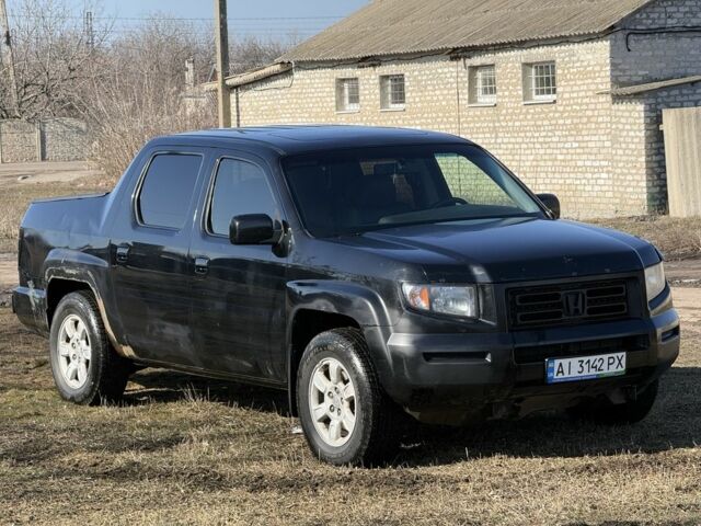 Чорний Хонда Ріджлайн, об'ємом двигуна 3.5 л та пробігом 198 тис. км за 5500 $, фото 2 на Automoto.ua