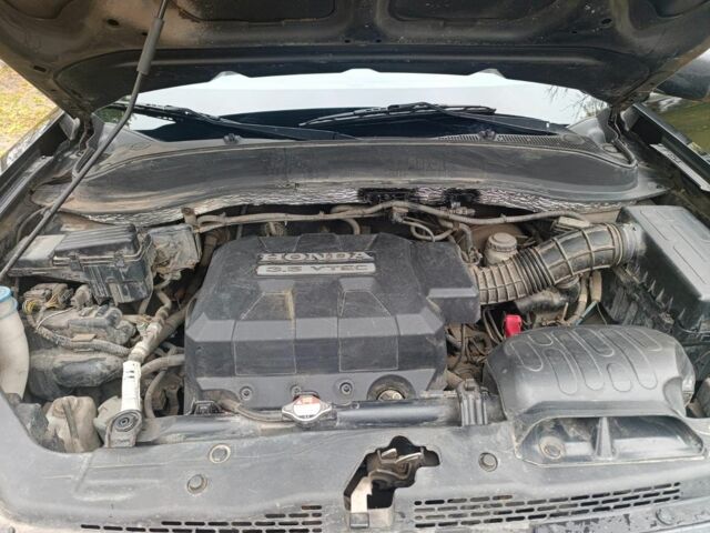 Хонда Ріджлайн 2006 у Харкові на Automoto.ua Чорний Хонда Ріджлайн, об'ємом двигуна 3.5 л та пробігом 277 тис. км за 7300 $, фото 11 на Automoto.ua