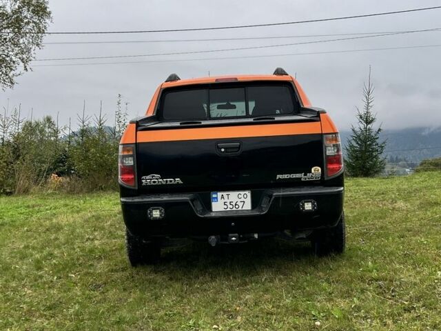 Чорний Хонда Ріджлайн, об'ємом двигуна 3.5 л та пробігом 298 тис. км за 16900 $, фото 4 на Automoto.ua