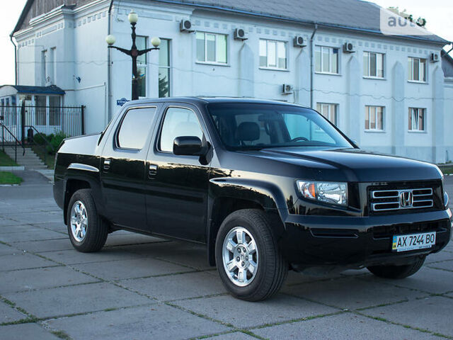 Черный Хонда Риджлайн, объемом двигателя 3.5 л и пробегом 130 тыс. км за 13500 $, фото 4 на Automoto.ua