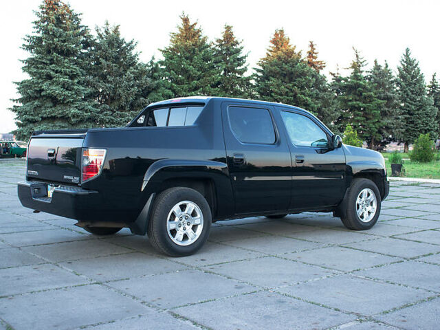 Черный Хонда Риджлайн, объемом двигателя 3.5 л и пробегом 130 тыс. км за 13500 $, фото 7 на Automoto.ua