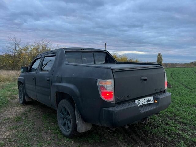 Чорний Хонда Ріджлайн, об'ємом двигуна 3.5 л та пробігом 300 тис. км за 3504 $, фото 3 на Automoto.ua