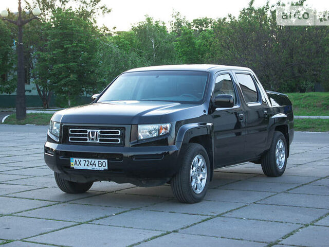 Черный Хонда Риджлайн, объемом двигателя 3.5 л и пробегом 130 тыс. км за 13500 $, фото 17 на Automoto.ua