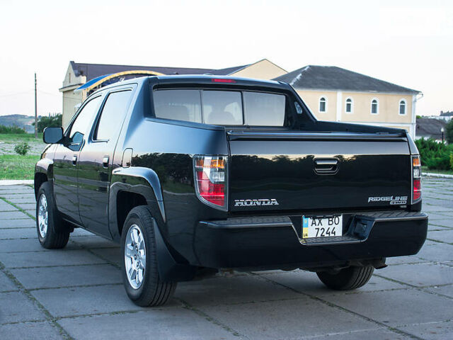 Черный Хонда Риджлайн, объемом двигателя 3.5 л и пробегом 130 тыс. км за 13500 $, фото 10 на Automoto.ua