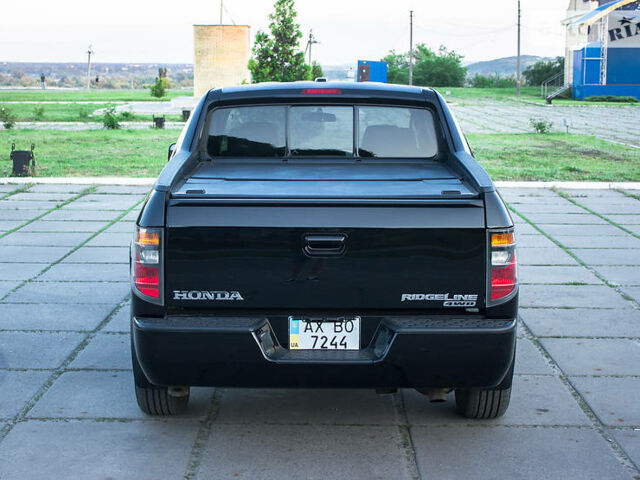Черный Хонда Риджлайн, объемом двигателя 3.5 л и пробегом 130 тыс. км за 13500 $, фото 9 на Automoto.ua