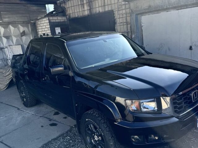 Черный Хонда Риджлайн, объемом двигателя 3.5 л и пробегом 303 тыс. км за 13500 $, фото 1 на Automoto.ua