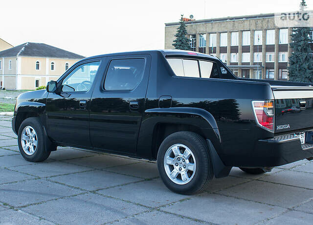 Черный Хонда Риджлайн, объемом двигателя 3.5 л и пробегом 130 тыс. км за 13500 $, фото 11 на Automoto.ua