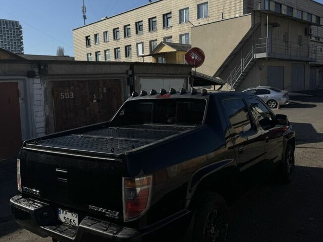 Черный Хонда Риджлайн, объемом двигателя 3.5 л и пробегом 303 тыс. км за 13500 $, фото 15 на Automoto.ua