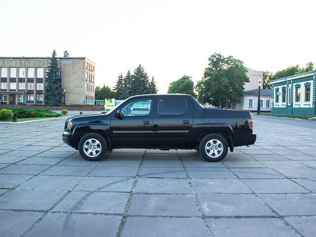 Черный Хонда Риджлайн, объемом двигателя 3.5 л и пробегом 130 тыс. км за 13500 $, фото 13 на Automoto.ua