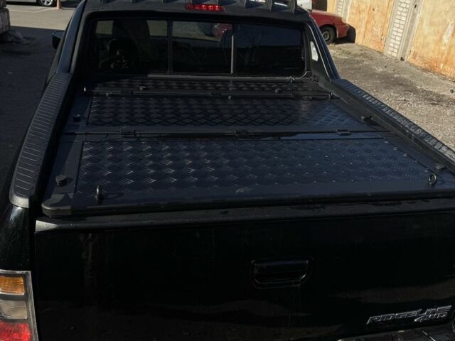 Черный Хонда Риджлайн, объемом двигателя 3.5 л и пробегом 303 тыс. км за 13500 $, фото 12 на Automoto.ua