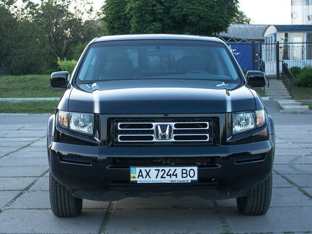 Черный Хонда Риджлайн, объемом двигателя 3.5 л и пробегом 130 тыс. км за 13500 $, фото 2 на Automoto.ua
