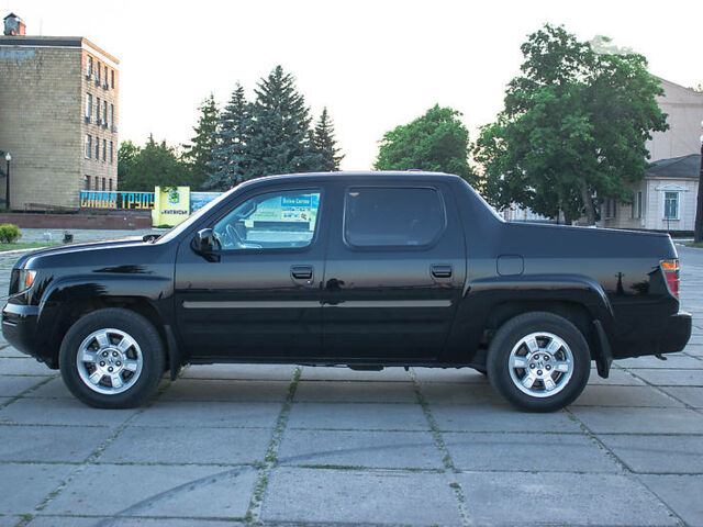 Черный Хонда Риджлайн, объемом двигателя 3.5 л и пробегом 130 тыс. км за 13500 $, фото 14 на Automoto.ua