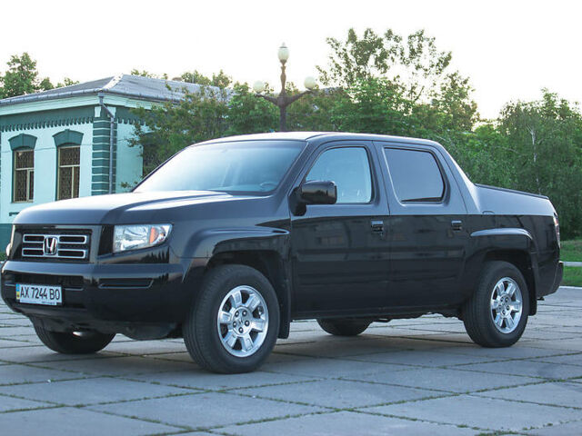 Черный Хонда Риджлайн, объемом двигателя 3.5 л и пробегом 130 тыс. км за 13500 $, фото 16 на Automoto.ua