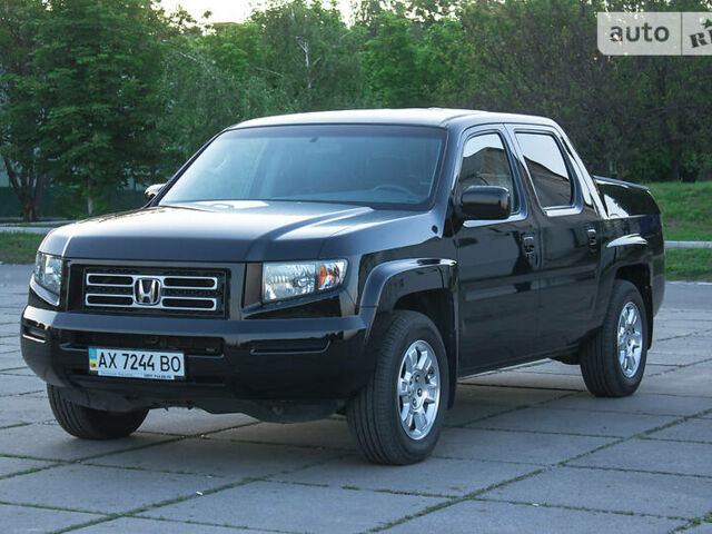 Черный Хонда Риджлайн, объемом двигателя 3.5 л и пробегом 130 тыс. км за 13500 $, фото 18 на Automoto.ua