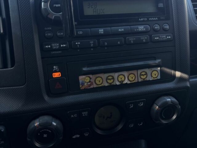 Черный Хонда Риджлайн, объемом двигателя 3.5 л и пробегом 303 тыс. км за 13500 $, фото 8 на Automoto.ua