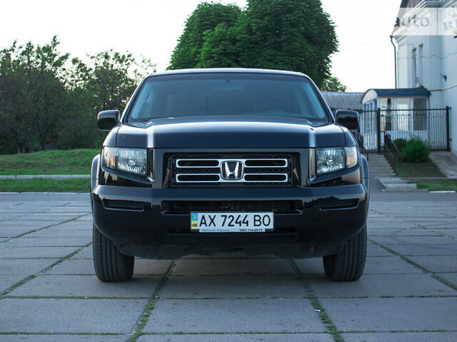 Черный Хонда Риджлайн, объемом двигателя 3.5 л и пробегом 130 тыс. км за 13500 $, фото 3 на Automoto.ua