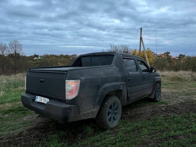Чорний Хонда Ріджлайн, об'ємом двигуна 3.5 л та пробігом 300 тис. км за 3504 $, фото 5 на Automoto.ua