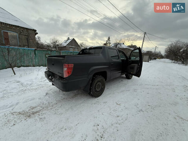 Черный Хонда Риджлайн, объемом двигателя 3.5 л и пробегом 260 тыс. км за 4700 $, фото 4 на Automoto.ua