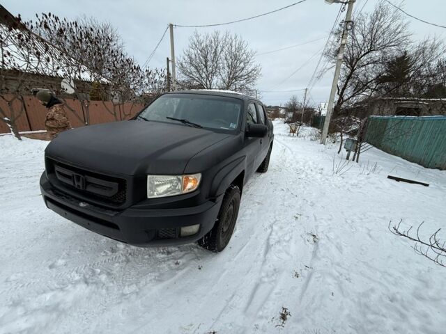 Черный Хонда Риджлайн, объемом двигателя 3.5 л и пробегом 260 тыс. км за 4700 $, фото 1 на Automoto.ua