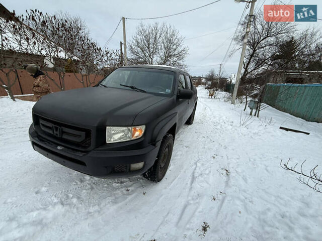Черный Хонда Риджлайн, объемом двигателя 3.5 л и пробегом 260 тыс. км за 4700 $, фото 1 на Automoto.ua