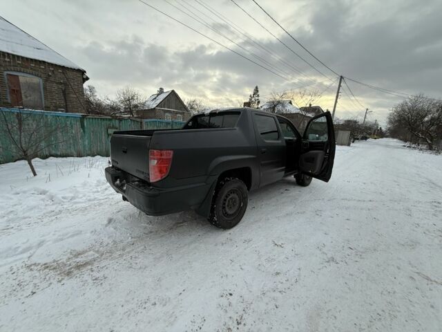 Черный Хонда Риджлайн, объемом двигателя 3.5 л и пробегом 260 тыс. км за 4700 $, фото 4 на Automoto.ua