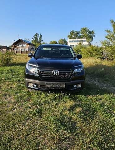 Чорний Хонда Ріджлайн, об'ємом двигуна 3.5 л та пробігом 160 тис. км за 23000 $, фото 8 на Automoto.ua