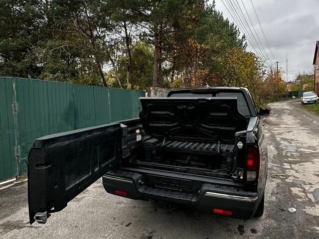 Чорний Хонда Ріджлайн, об'ємом двигуна 3.5 л та пробігом 150 тис. км за 19900 $, фото 11 на Automoto.ua