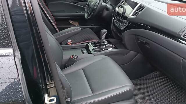 Хонда Ріджлайн 2018 у Новомосковске на Automoto.ua Чорний Хонда Ріджлайн, об'ємом двигуна 3.5 л та пробігом 67 тис. км за 26000 $, фото 9 на Automoto.ua