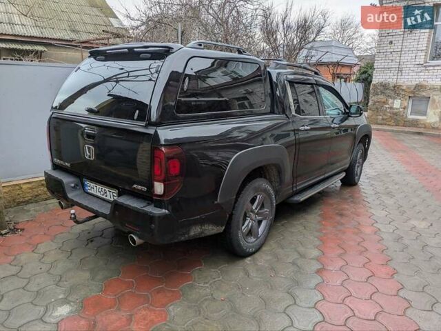 Черный Хонда Риджлайн, объемом двигателя 3.47 л и пробегом 60 тыс. км за 33000 $, фото 3 на Automoto.ua
