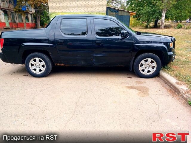 Чорний Хонда Ріджлайн, об'ємом двигуна 3.5 л та пробігом 270 тис. км за 4710 $, фото 1 на Automoto.ua