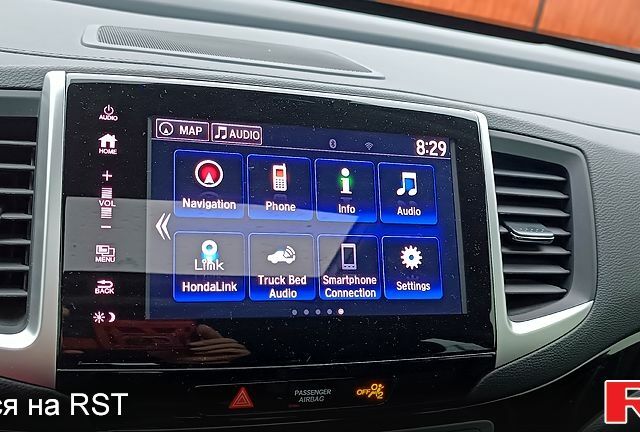 Чорний Хонда Ріджлайн, об'ємом двигуна 3.5 л та пробігом 67 тис. км за 26000 $, фото 8 на Automoto.ua