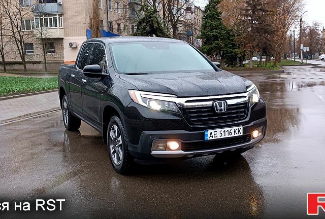 Чорний Хонда Ріджлайн, об'ємом двигуна 3.5 л та пробігом 67 тис. км за 26000 $, фото 2 на Automoto.ua