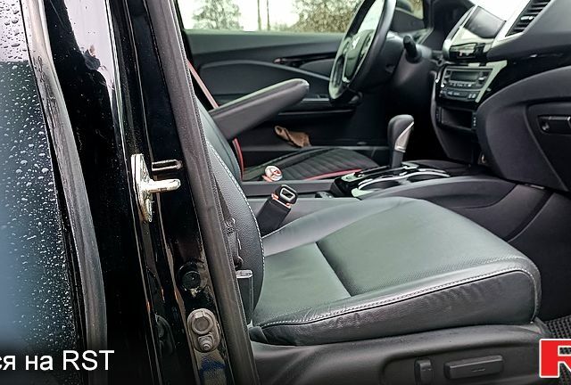 Чорний Хонда Ріджлайн, об'ємом двигуна 3.5 л та пробігом 67 тис. км за 26000 $, фото 4 на Automoto.ua