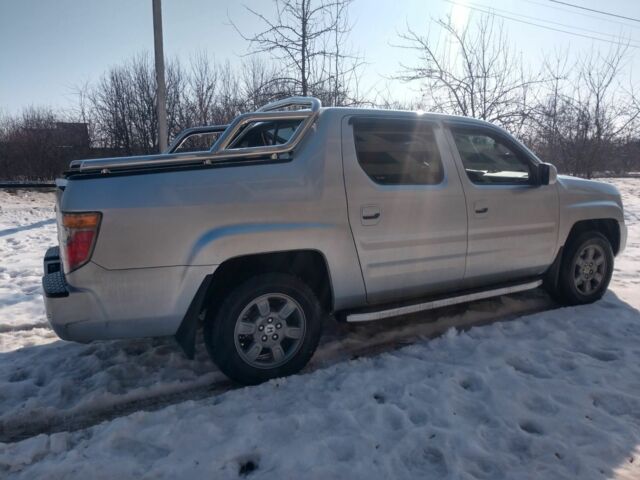 Серый Хонда Риджлайн, объемом двигателя 3.5 л и пробегом 230 тыс. км за 13900 $, фото 3 на Automoto.ua