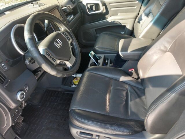 Серый Хонда Риджлайн, объемом двигателя 3.5 л и пробегом 230 тыс. км за 13900 $, фото 4 на Automoto.ua