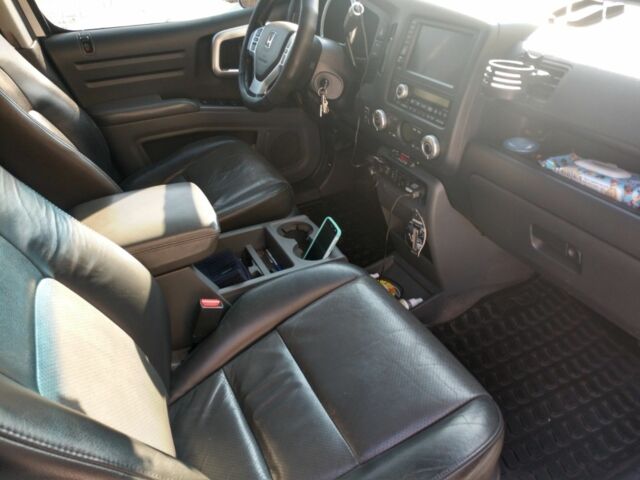 Серый Хонда Риджлайн, объемом двигателя 3.5 л и пробегом 230 тыс. км за 13900 $, фото 7 на Automoto.ua