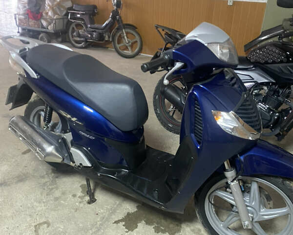 Синий Хонда SH 125, объемом двигателя 0.12 л и пробегом 9 тыс. км за 1150 $, фото 1 на Automoto.ua
