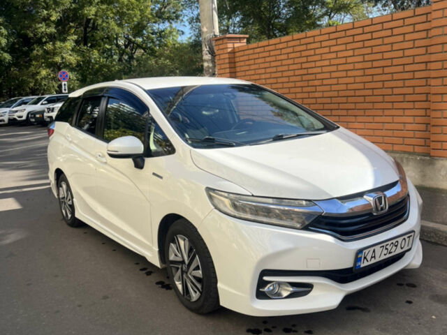 Белый Хонда Шатл, объемом двигателя 1.5 л и пробегом 105 тыс. км за 14400 $, фото 2 на Automoto.ua