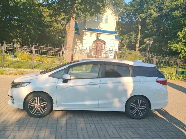 Белый Хонда Шатл, объемом двигателя 1.5 л и пробегом 68 тыс. км за 13000 $, фото 2 на Automoto.ua