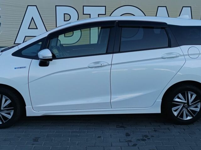 Белый Хонда Шатл, объемом двигателя 1.5 л и пробегом 89 тыс. км за 13999 $, фото 2 на Automoto.ua
