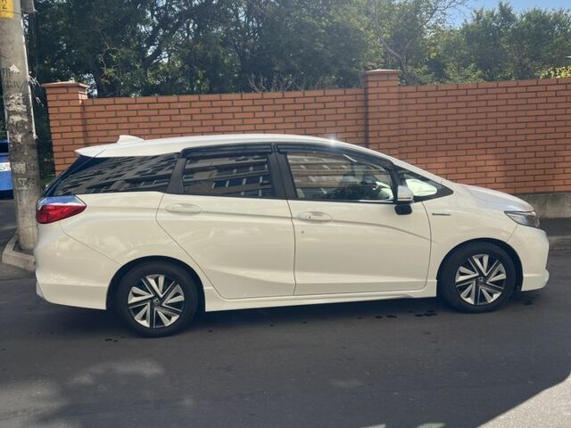 Белый Хонда Шатл, объемом двигателя 1.5 л и пробегом 96 тыс. км за 14300 $, фото 4 на Automoto.ua