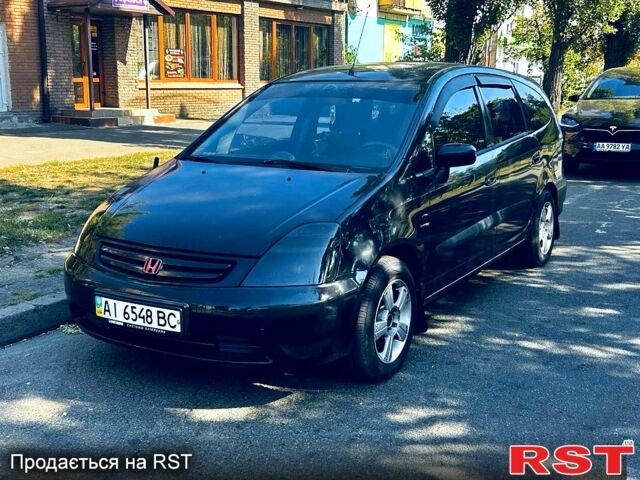 Черный Хонда Шатл, объемом двигателя 2 л и пробегом 271 тыс. км за 4300 $, фото 1 на Automoto.ua