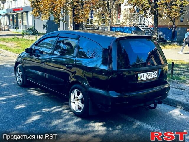 Черный Хонда Шатл, объемом двигателя 2 л и пробегом 271 тыс. км за 4300 $, фото 2 на Automoto.ua