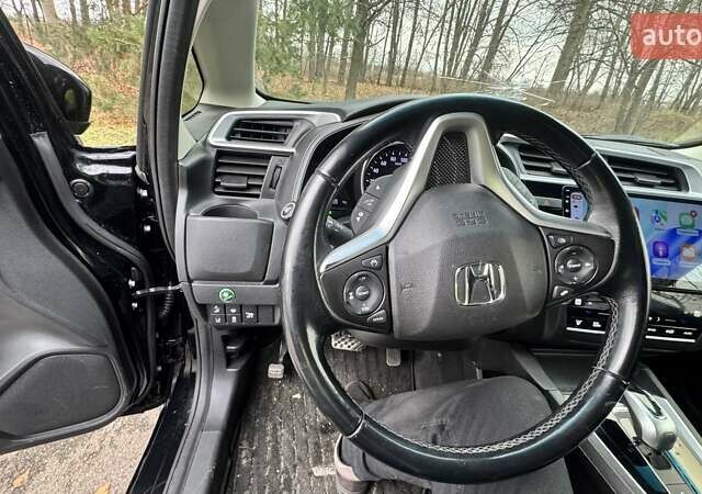 Черный Хонда Шатл, объемом двигателя 1.5 л и пробегом 60 тыс. км за 12500 $, фото 32 на Automoto.ua